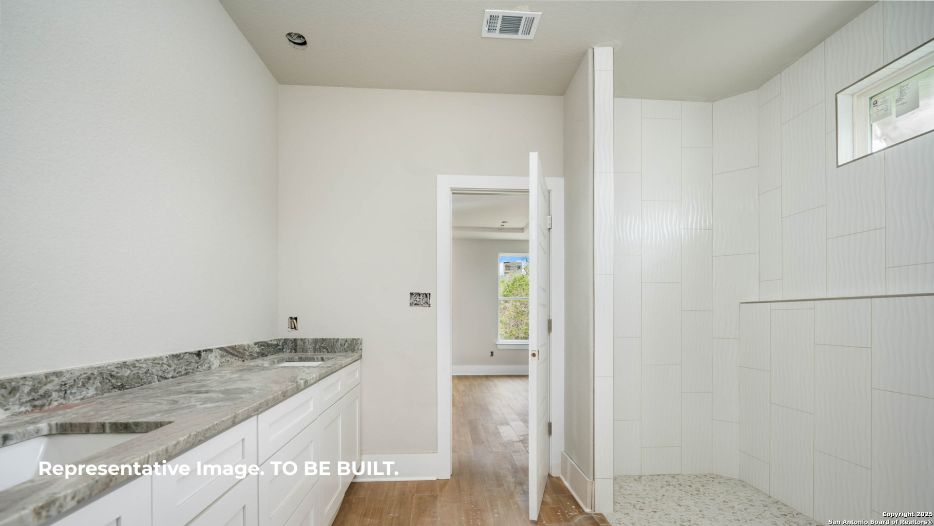 532 Restless Wind Spring Branch, TX 78070 - Photo 12 of 16 a bathroom with a granite countertop sink and a mirror