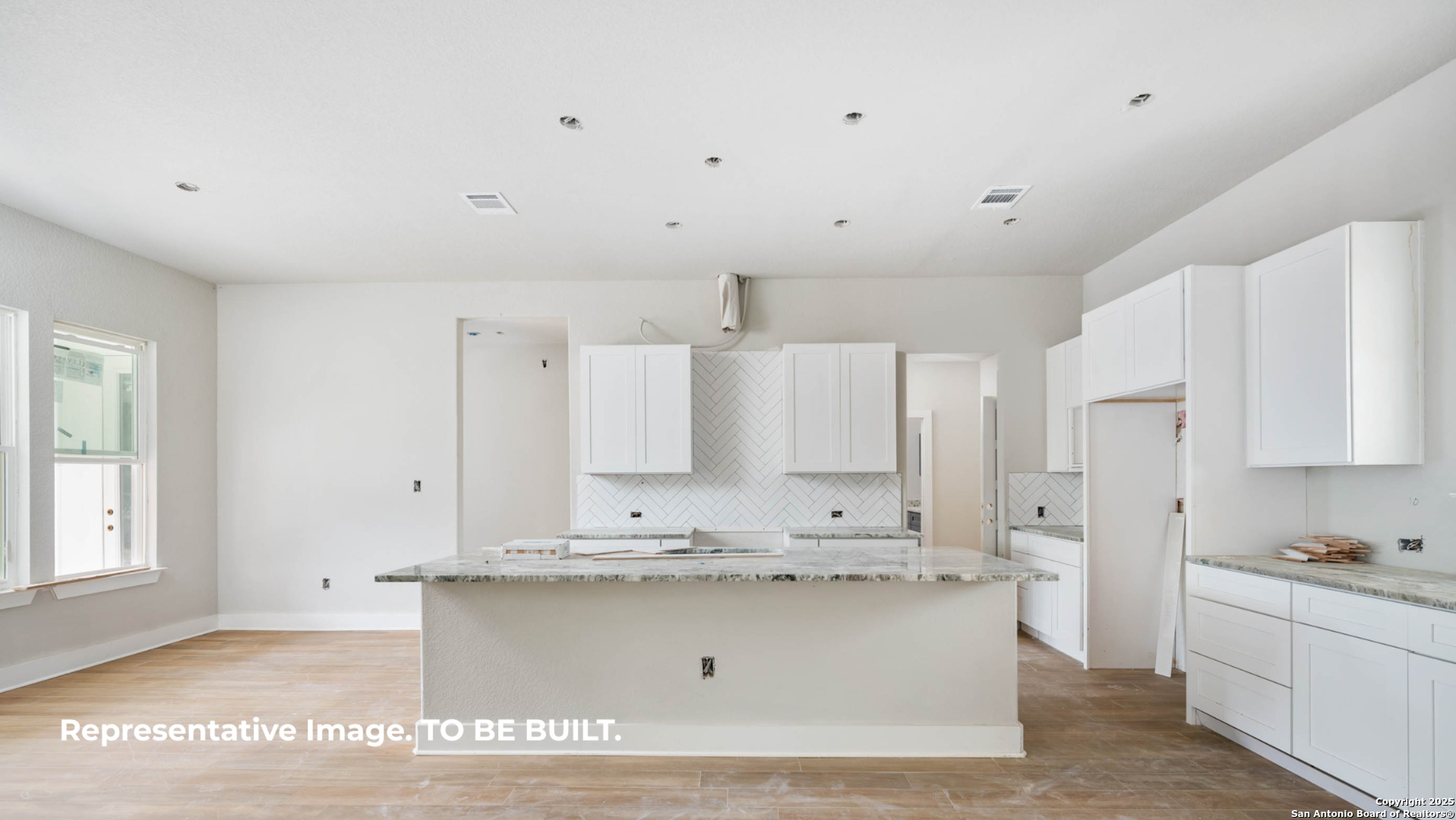 532 Restless Wind Spring Branch, TX 78070 - Photo 7 of 16 a view of kitchen with white cabinets