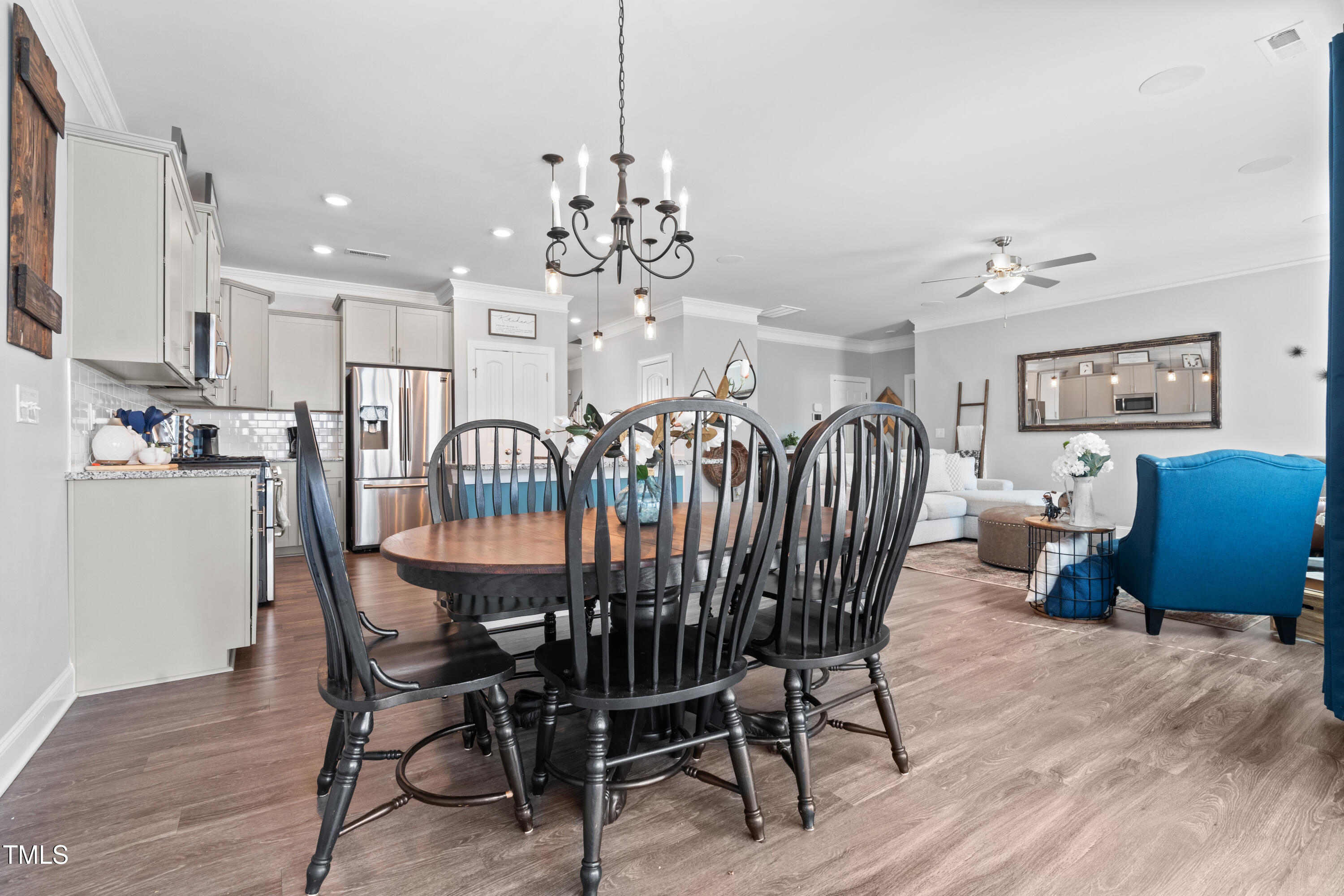 115 Cliffview Drive Garner, NC 27529 - Photo 17 of 52 a view of a dining room with furniture and chandelier