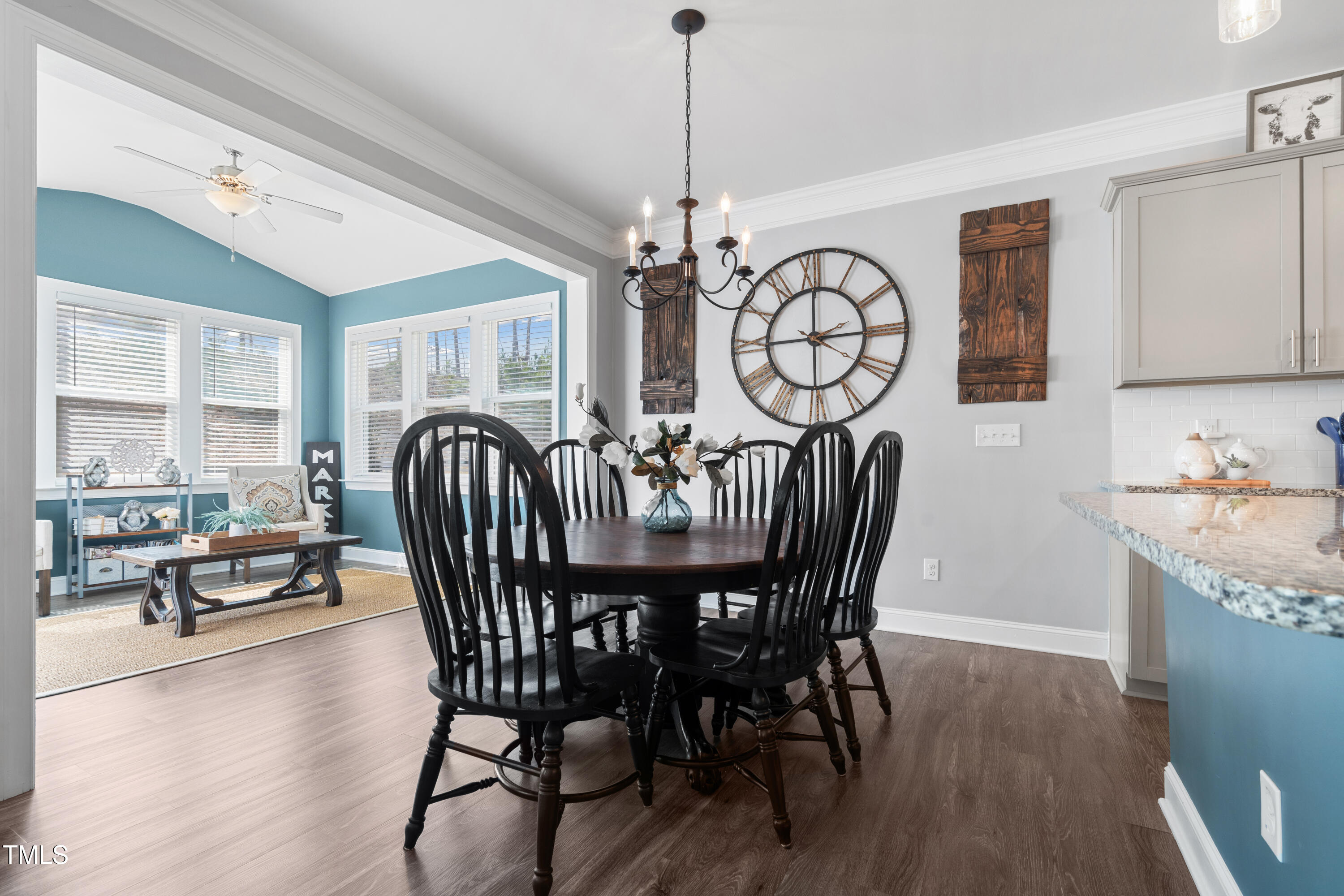 115 Cliffview Drive Garner, NC 27529 - Photo 18 of 52 a view of a dining room with furniture window and wooden floor
