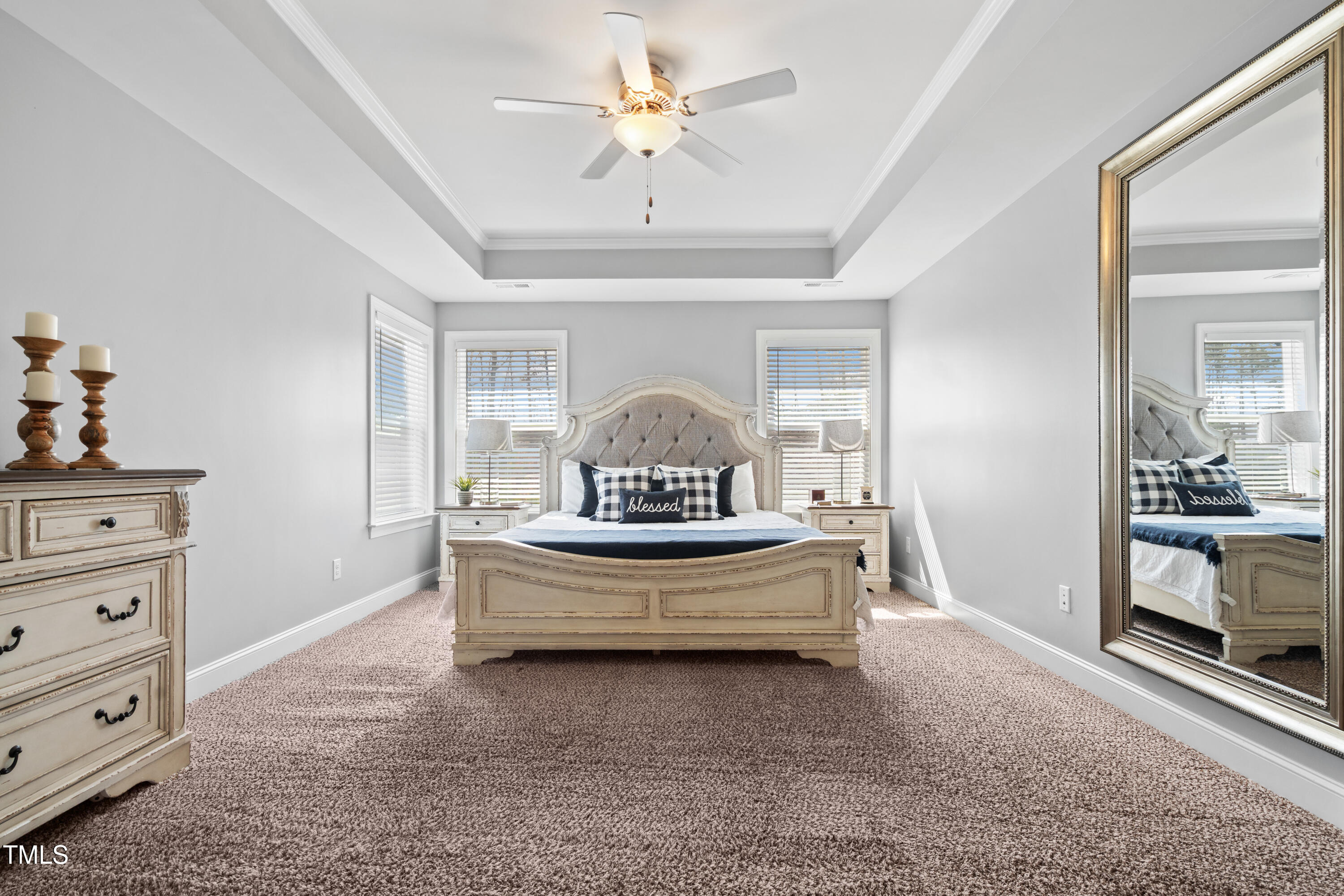 115 Cliffview Drive Garner, NC 27529 - Photo 24 of 52 a living room with furniture and a chandelier