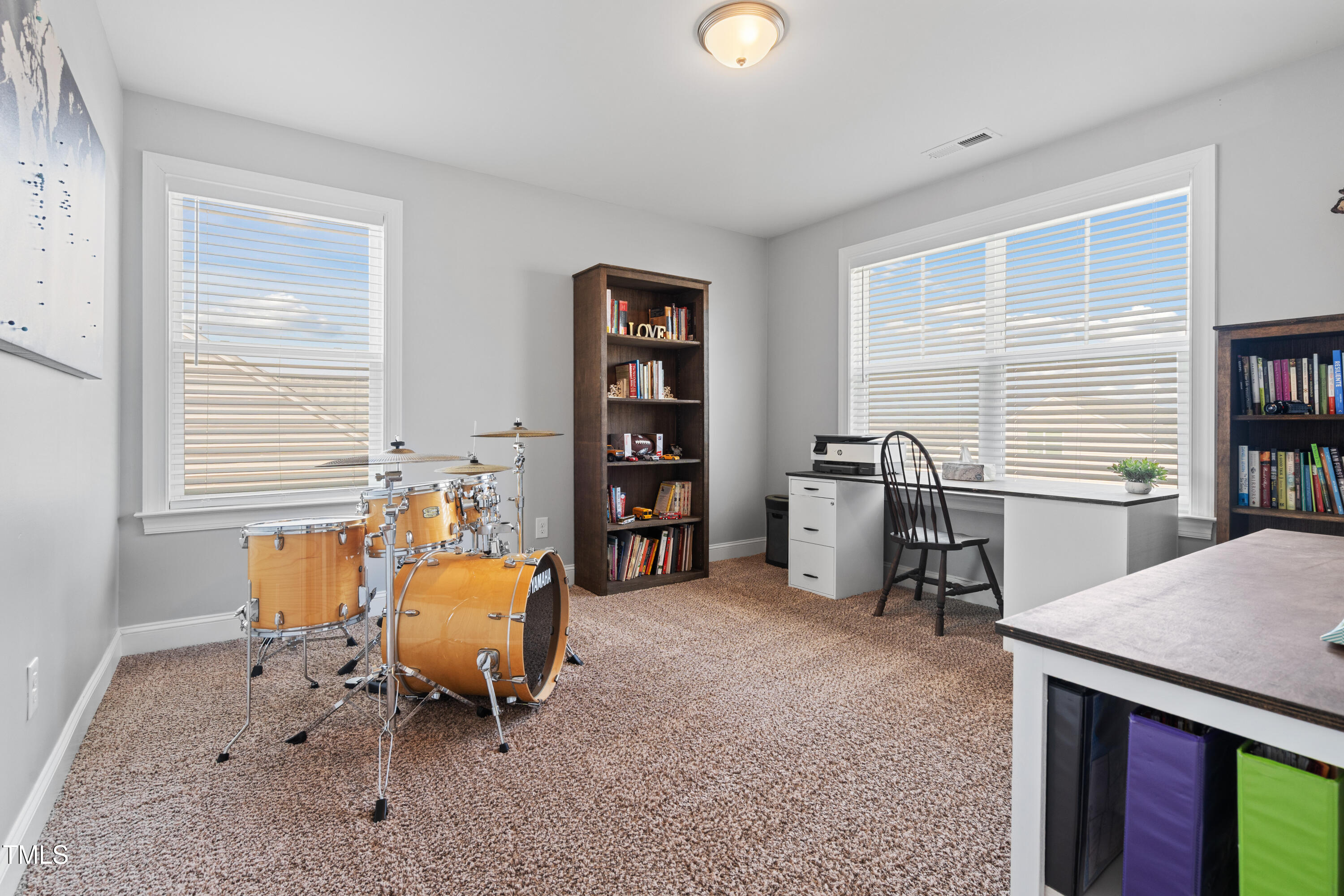 115 Cliffview Drive Garner, NC 27529 - Photo 33 of 52 a bedroom with furniture and a window