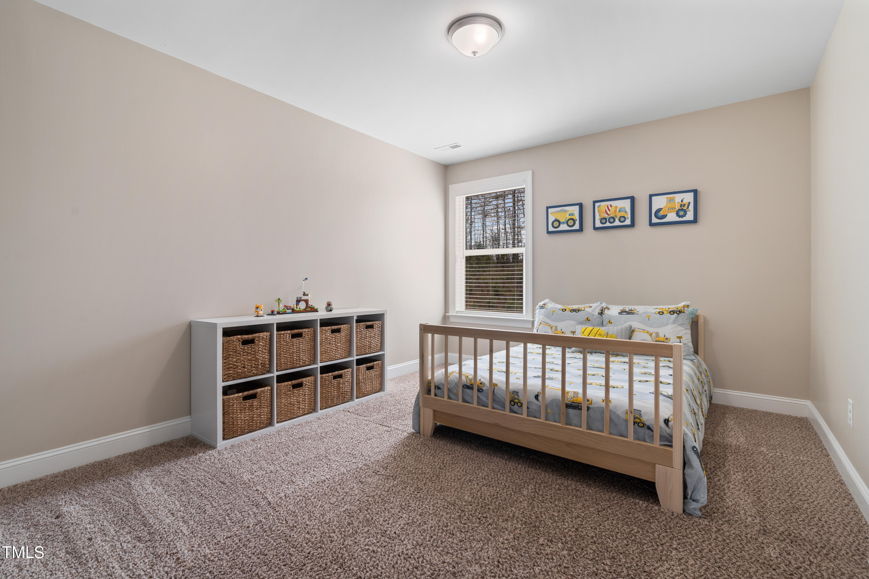 115 Cliffview Drive Garner, NC 27529 - Photo 35 of 52 a view of a bedroom with furniture and window
