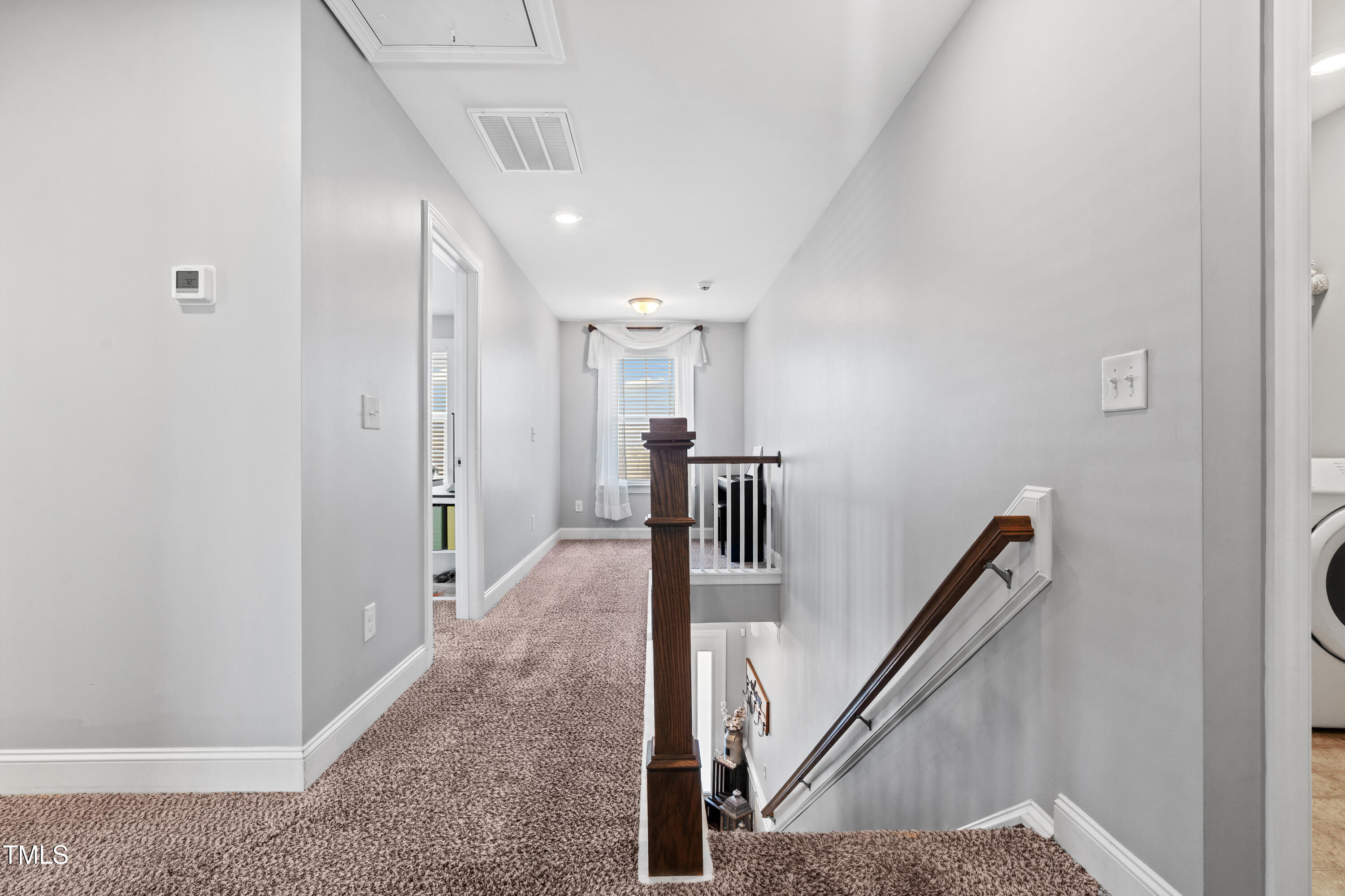 115 Cliffview Drive Garner, NC 27529 - Photo 38 of 52 a view of a hallway with staircase