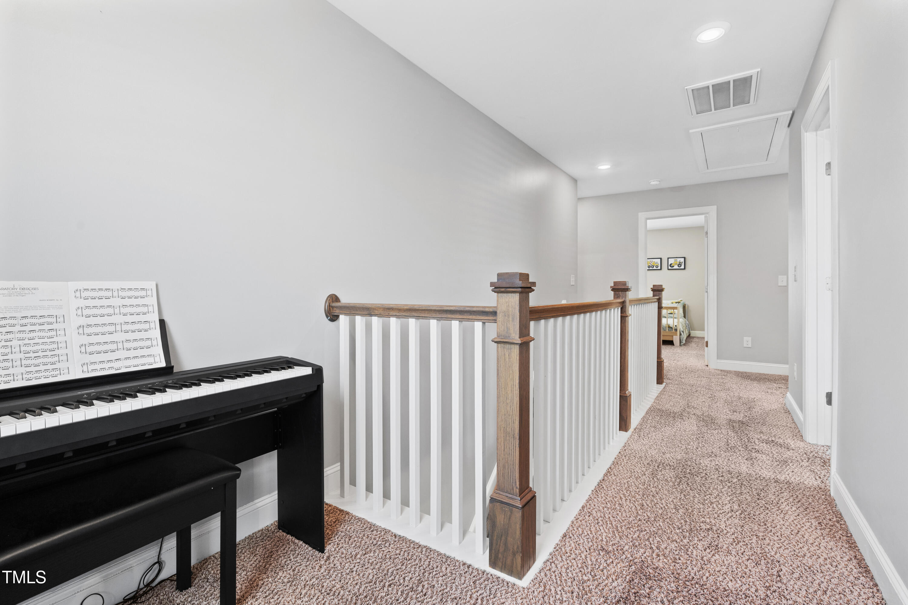 115 Cliffview Drive Garner, NC 27529 - Photo 39 of 52 a view of a hallway with workspace