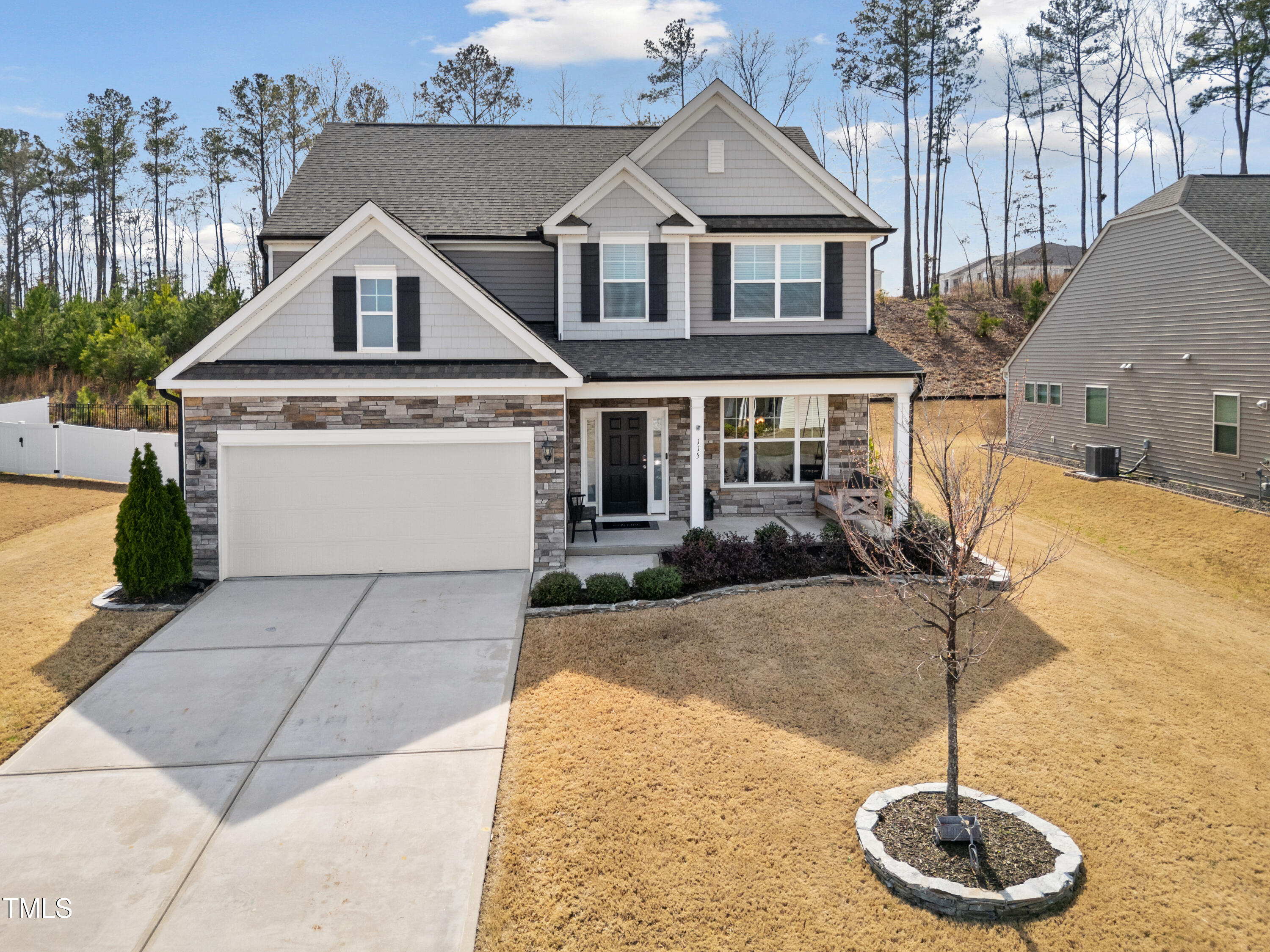 115 Cliffview Drive Garner, NC 27529 - Photo 45 of 52 a front view of a house with a yard
