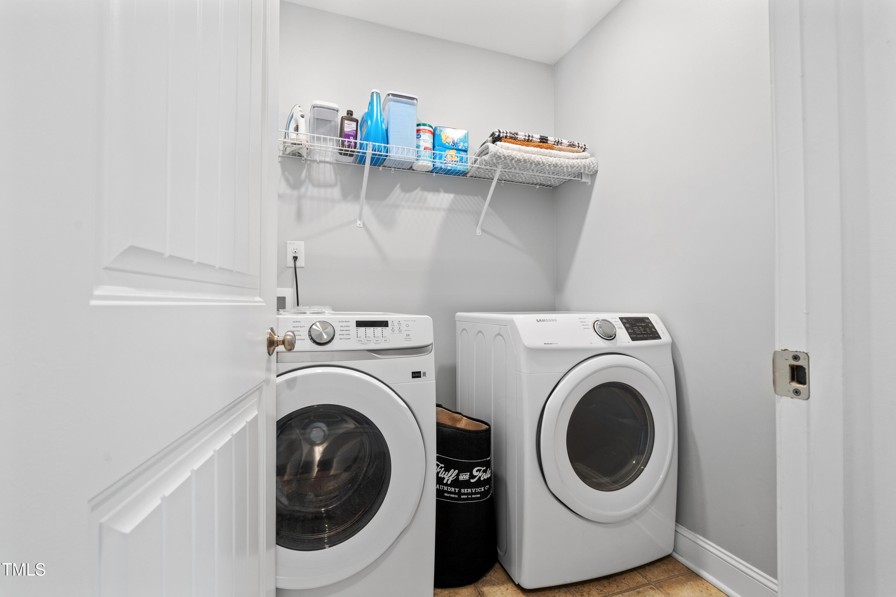 115 Cliffview Drive Garner, NC 27529 - Photo 47 of 52 a utility room with dryer and washer
