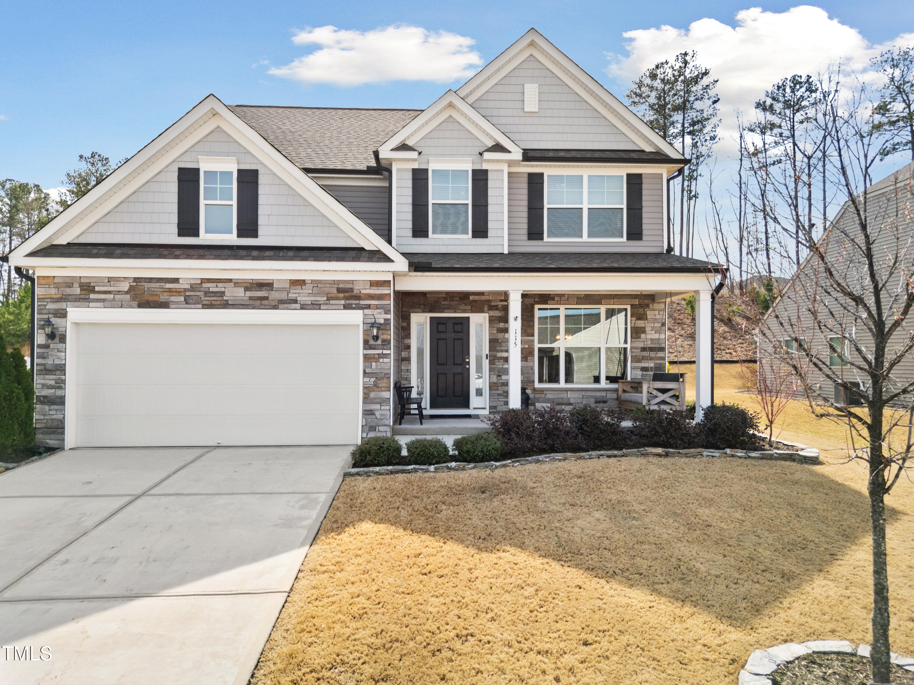 115 Cliffview Drive Garner, NC 27529 - Photo 49 of 52 a front view of a house with a yard