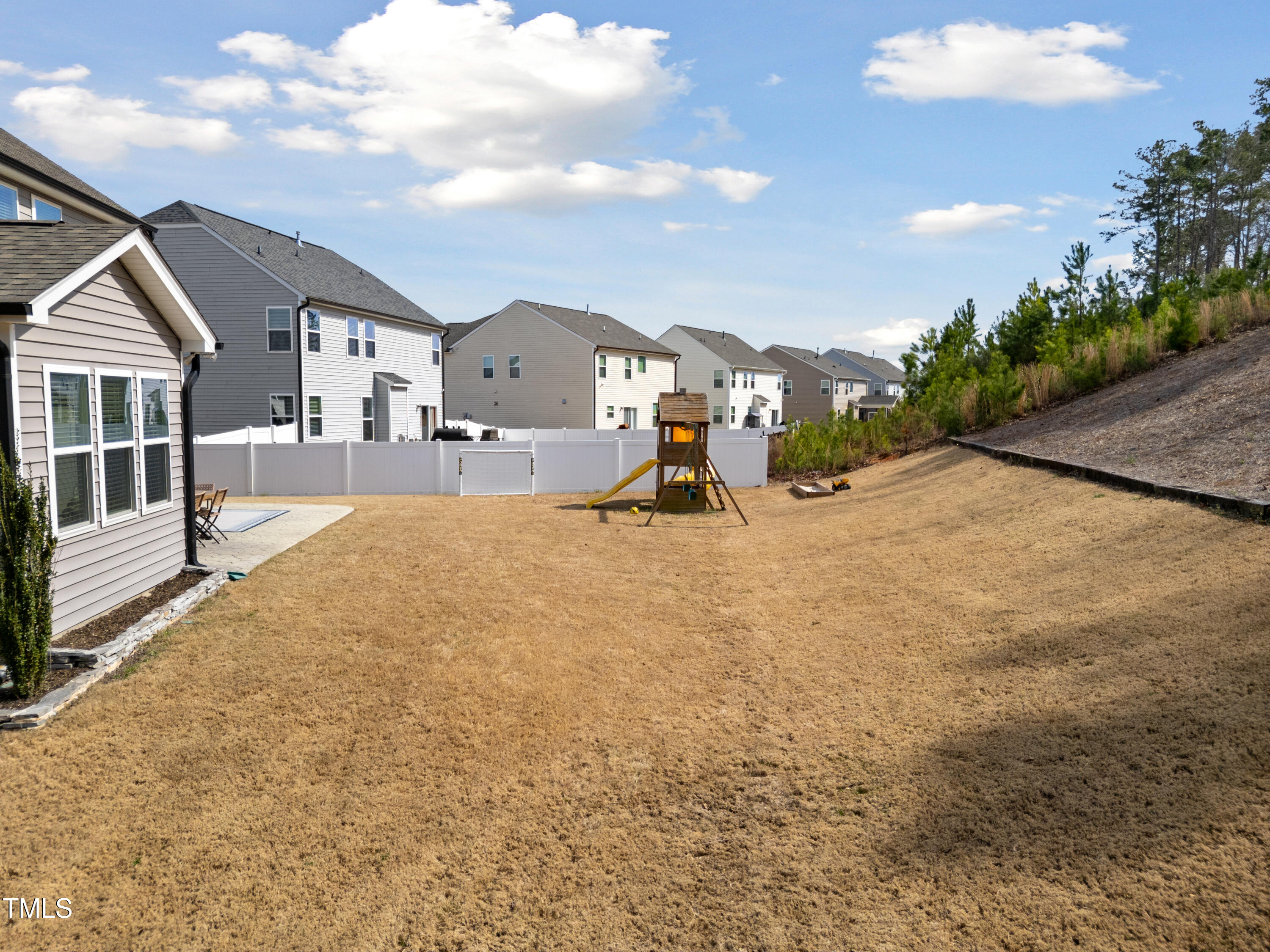 115 Cliffview Drive Garner, NC 27529 - Photo 7 of 52 a view of a house with a yard