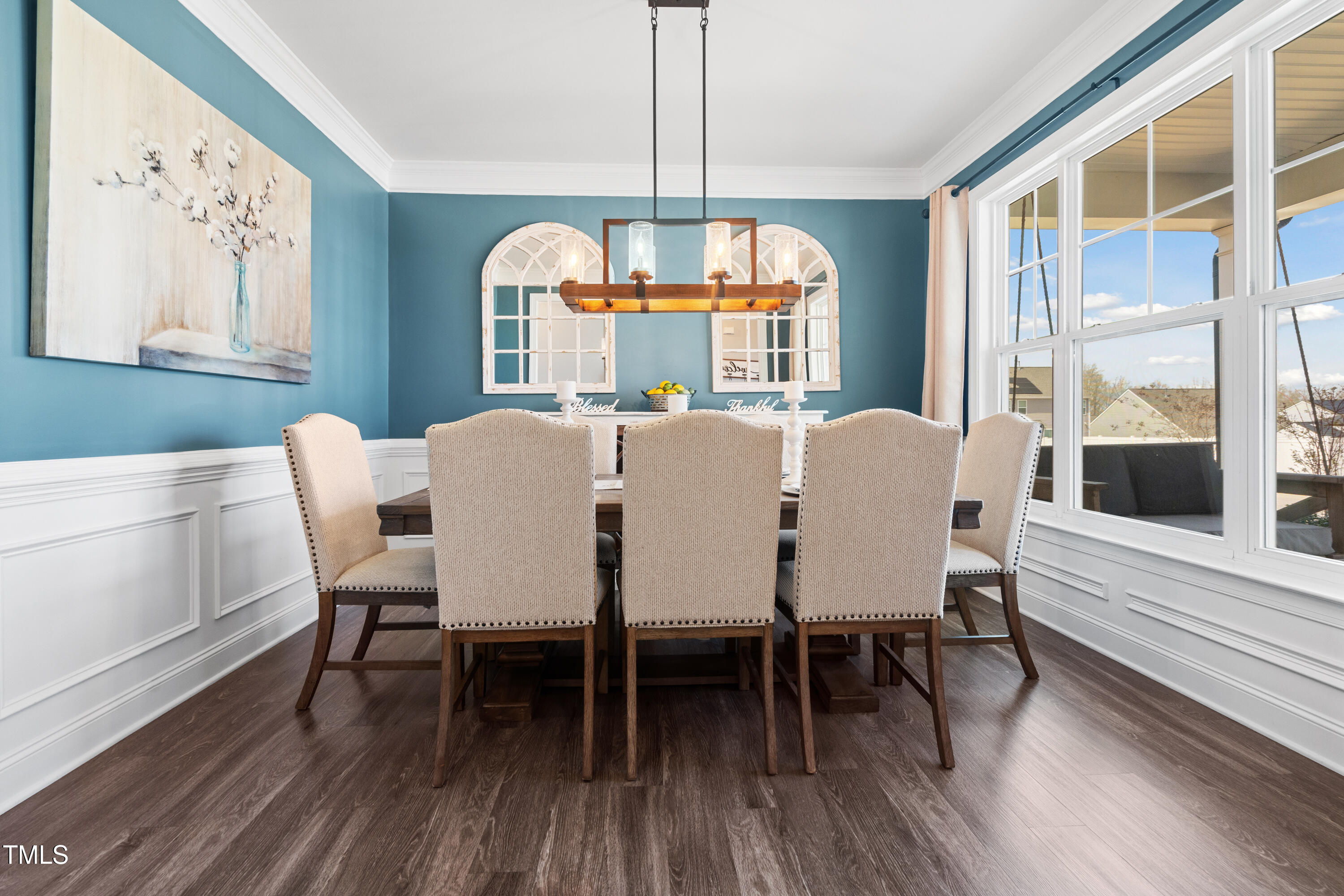 115 Cliffview Drive Garner, NC 27529 - Photo 8 of 52 a view of a dining room with furniture window and wooden floor