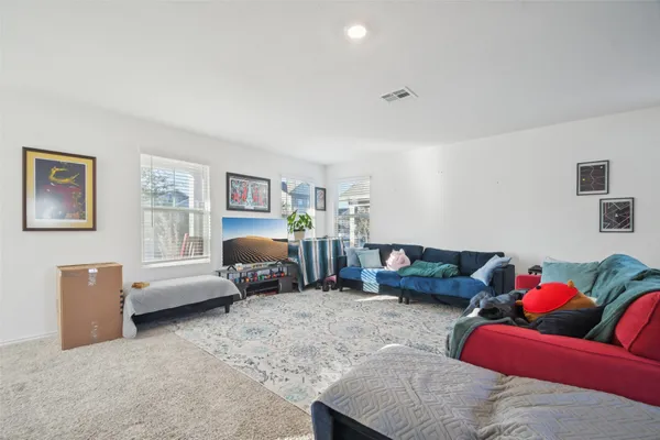 a living room with furniture and a couch