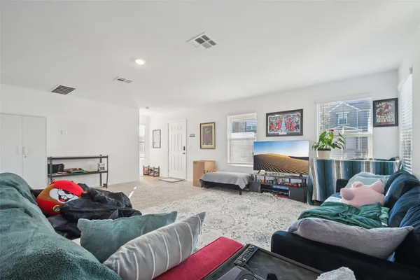 a living room with furniture and a couch