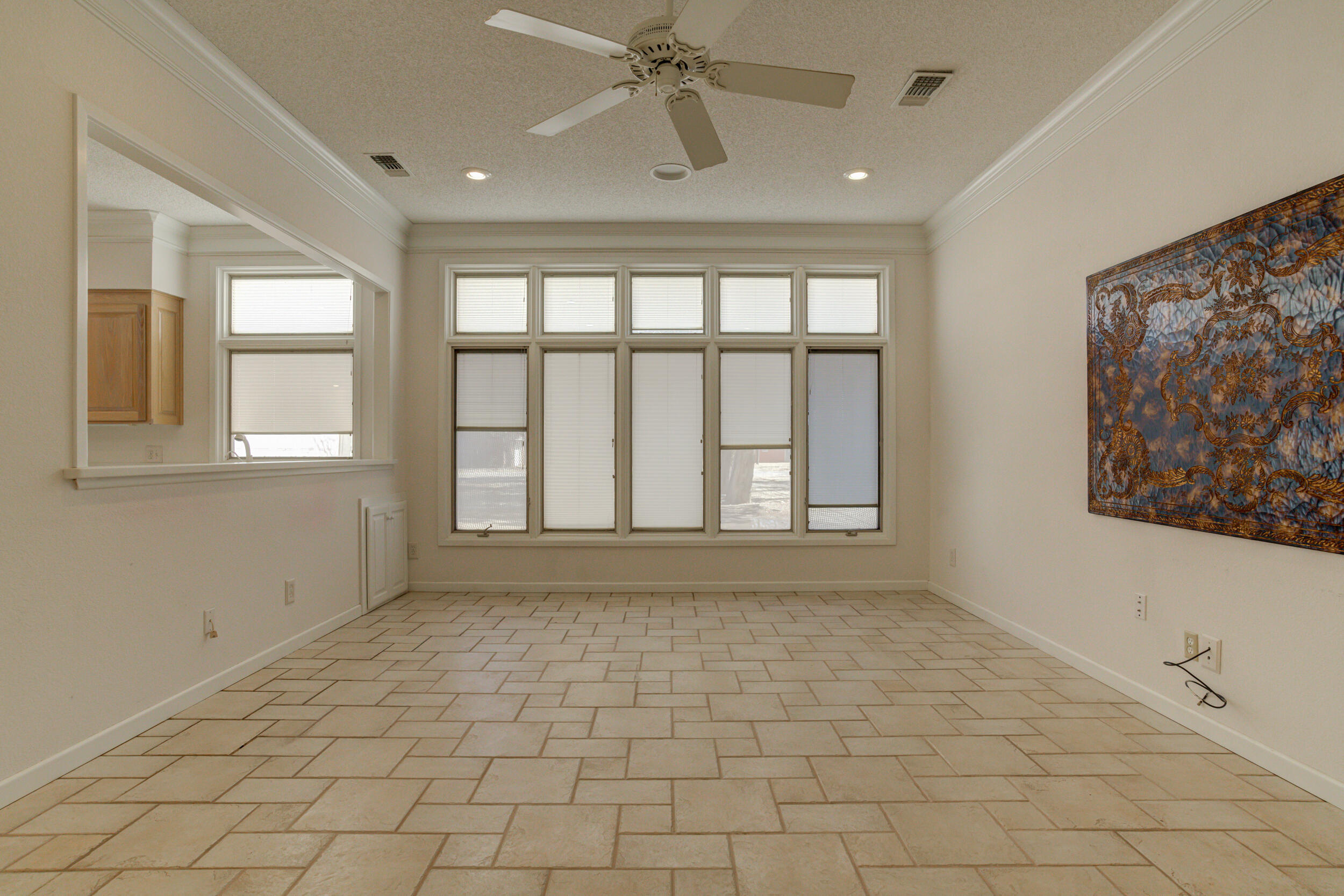 601 18th Street Seagraves, TX 79359 - Photo 6 of 19 a view of an empty room with a window