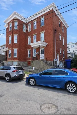 a car parked in front of a building
