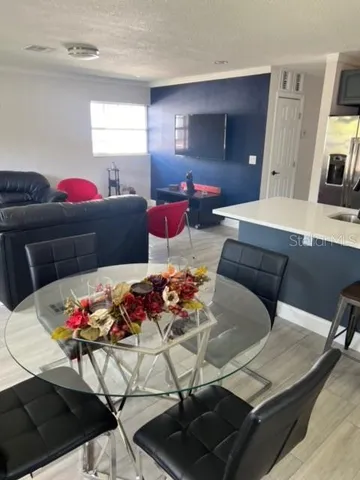 a living room with furniture and a table