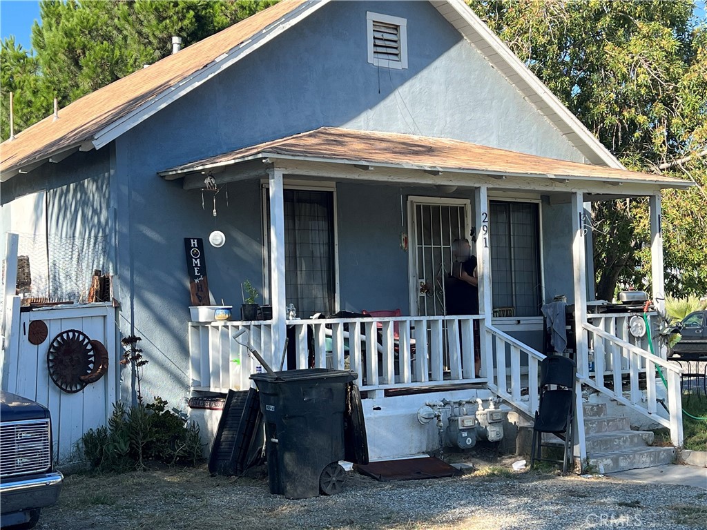 291 East C Street, Unit A Colton, CA 92324 - Photo 2 of 3 a view of a house with a porch and furniture