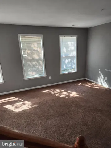 a view of an empty room with window