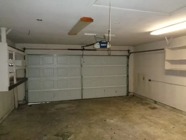 a view of storage and utility room with racks on the wall