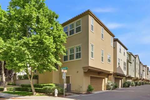 a front view of a building with street view