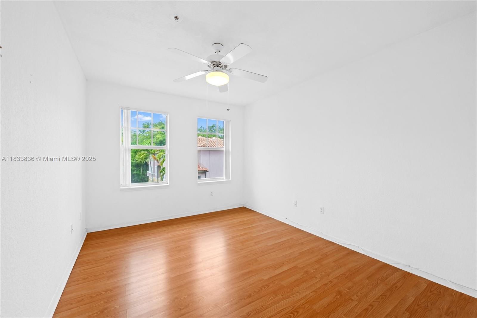 6722 West Sample Road, Unit 6722 Coral Springs, FL 33067 - Photo 13 of 23 a view of empty room with window