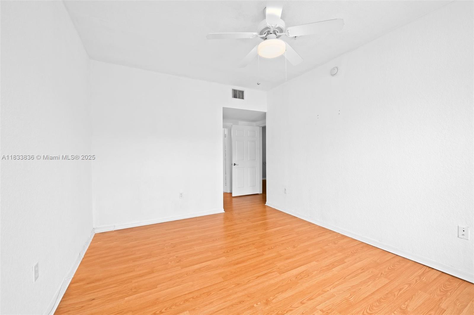 6722 West Sample Road, Unit 6722 Coral Springs, FL 33067 - Photo 14 of 23 a view of an empty room