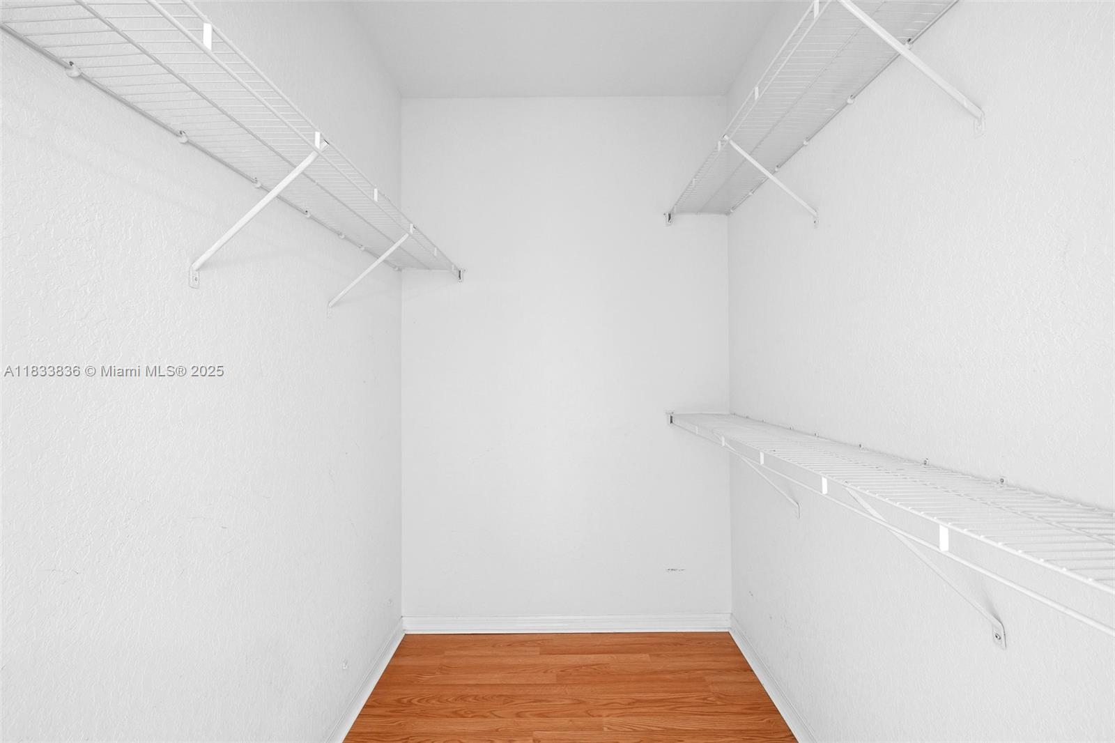 6722 West Sample Road, Unit 6722 Coral Springs, FL 33067 - Photo 19 of 23 a view of walk in closet