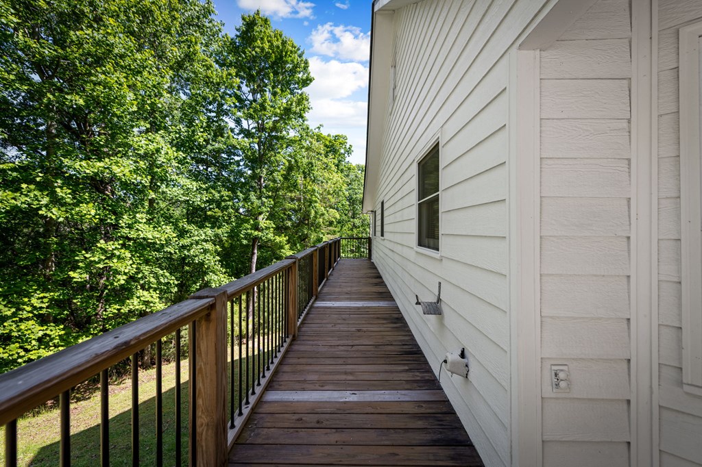 760 River Bend Lane Blue Ridge, GA 30513 - Photo 65 of 101 a view of a balcony with wooden stairs