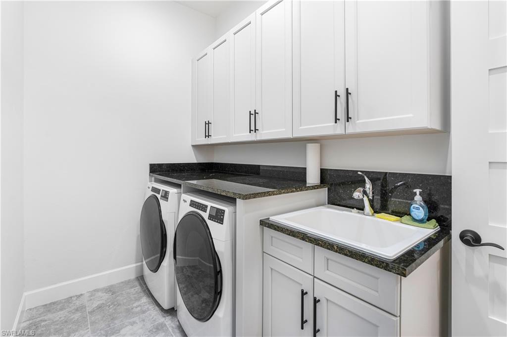 6847 Saona Court Naples, FL 34113 - Photo 18 of 47 a utility room with sink dryer and washer