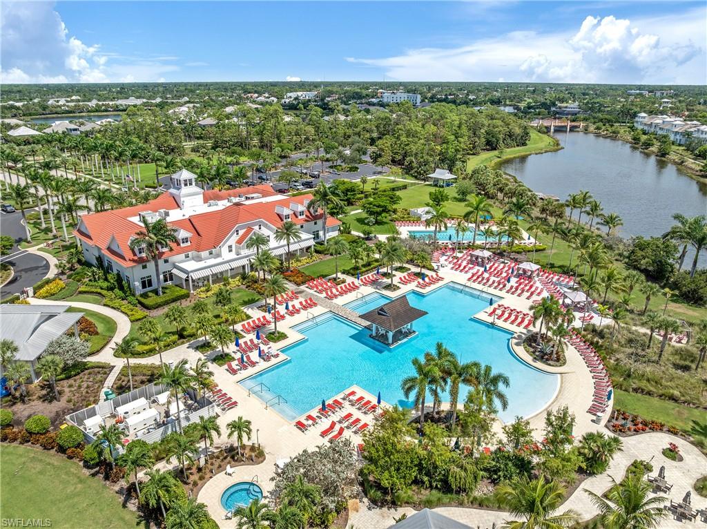 6847 Saona Court Naples, FL 34113 - Photo 33 of 47 an aerial view of residential houses with outdoor space