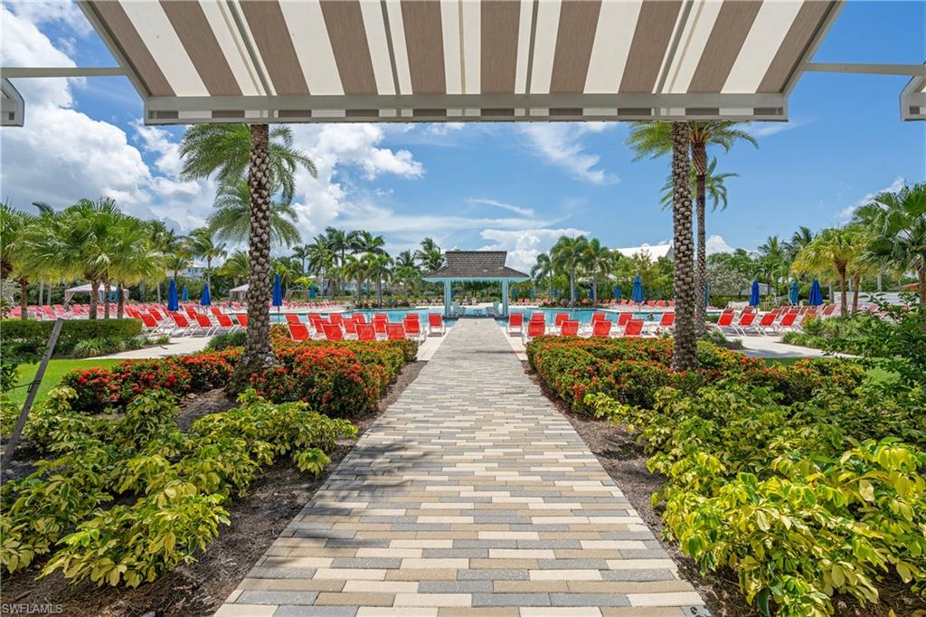 6847 Saona Court Naples, FL 34113 - Photo 34 of 47 a view of small garden