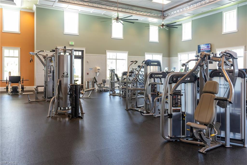 6847 Saona Court Naples, FL 34113 - Photo 41 of 47 a view of a room with gym equipment