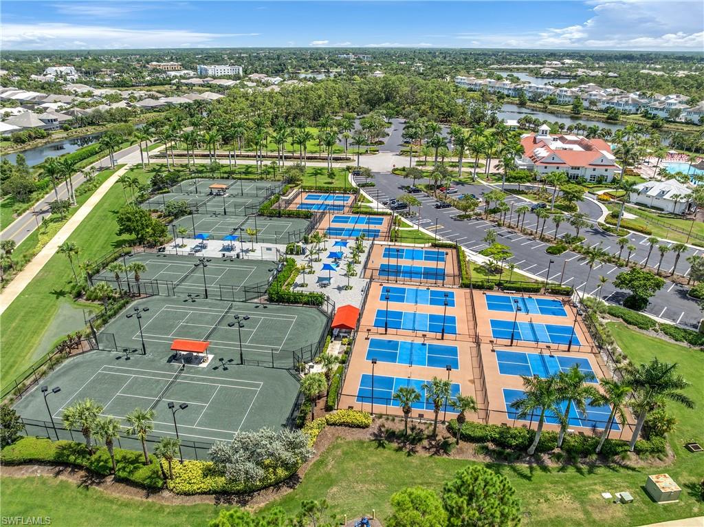 6847 Saona Court Naples, FL 34113 - Photo 42 of 47 an aerial view of multiple house