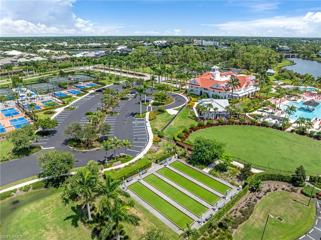 6847 Saona Court Naples, FL 34113 - Photo 44 of 47 an aerial view of a residential houses with outdoor space and street view