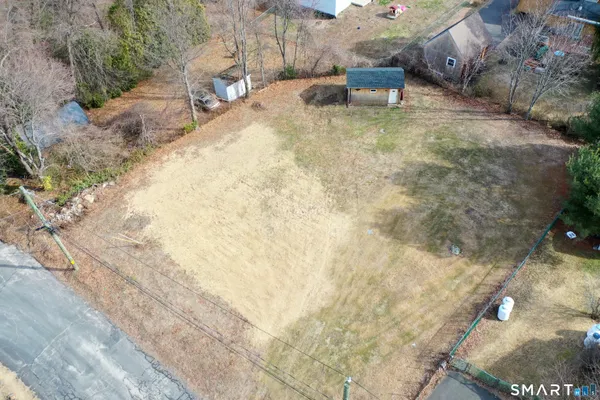a view of a backyard of a house