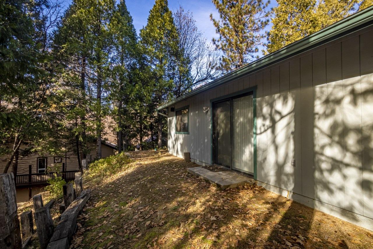 59634 Cascadel Drive North Fork, CA 93643 - Photo 35 of 52 a view of a yard with large tree