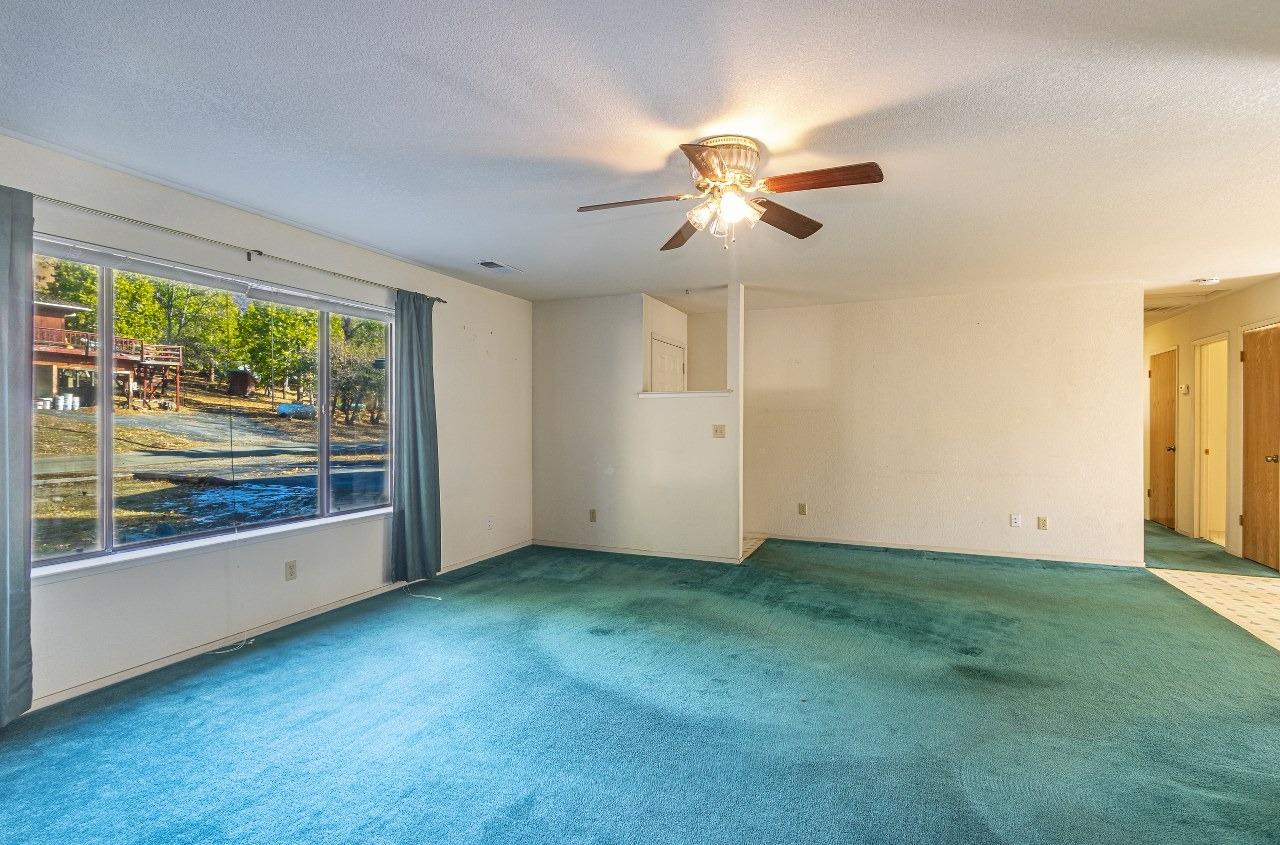 59634 Cascadel Drive North Fork, CA 93643 - Photo 4 of 52 wooden floor in an empty room with a window