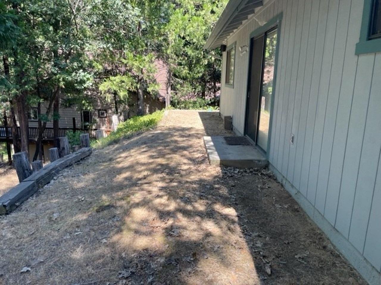 59634 Cascadel Drive North Fork, CA 93643 - Photo 46 of 52 a view of a backyard with pathway