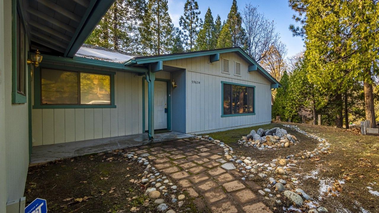 59634 Cascadel Drive North Fork, CA 93643 - Photo 49 of 52 a house with a tree in front of it