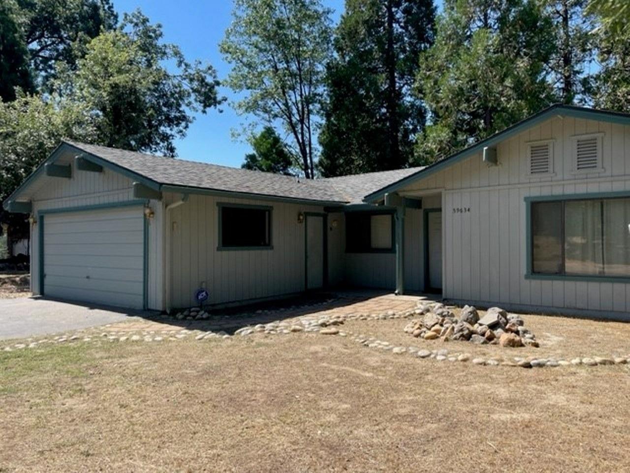 59634 Cascadel Drive North Fork, CA 93643 - Photo 52 of 52 a front view of a house