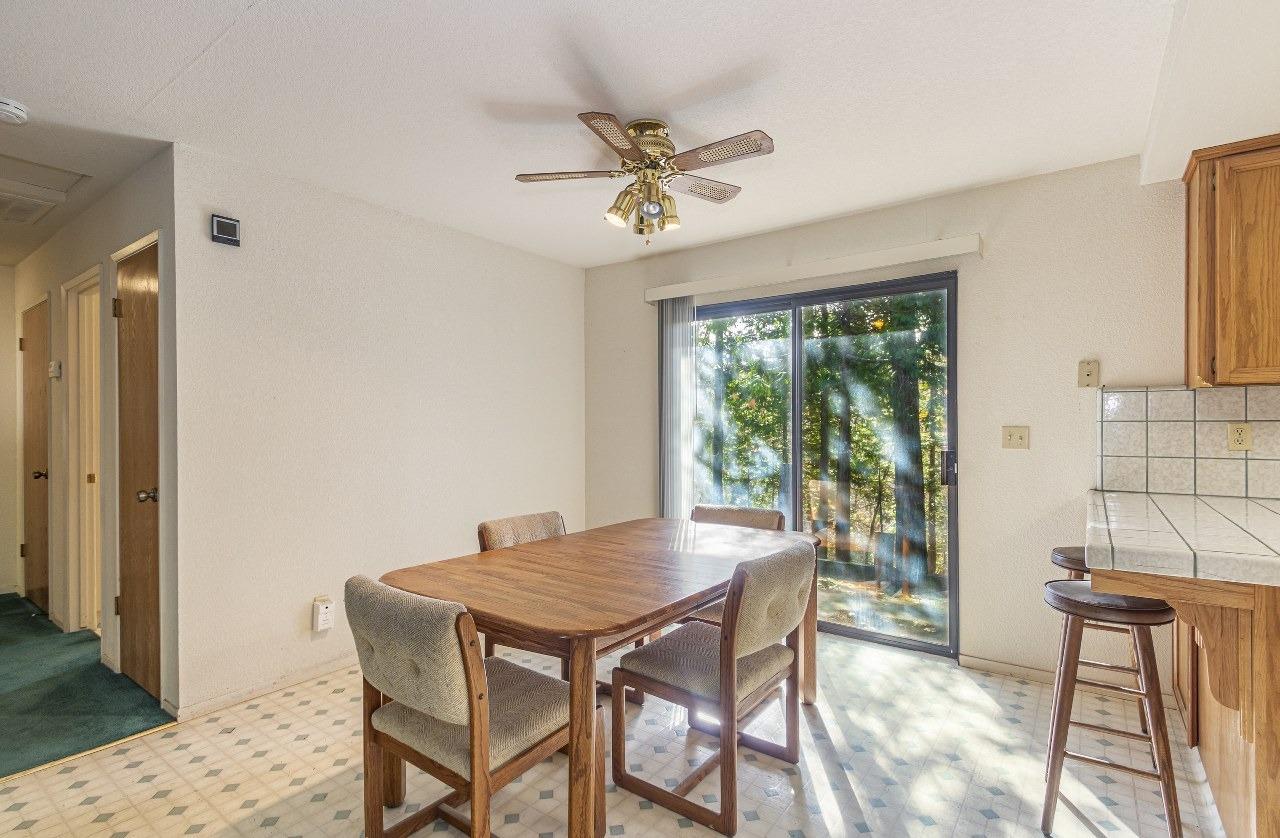 59634 Cascadel Drive North Fork, CA 93643 - Photo 9 of 52 a view of a dining room with furniture window and outside view
