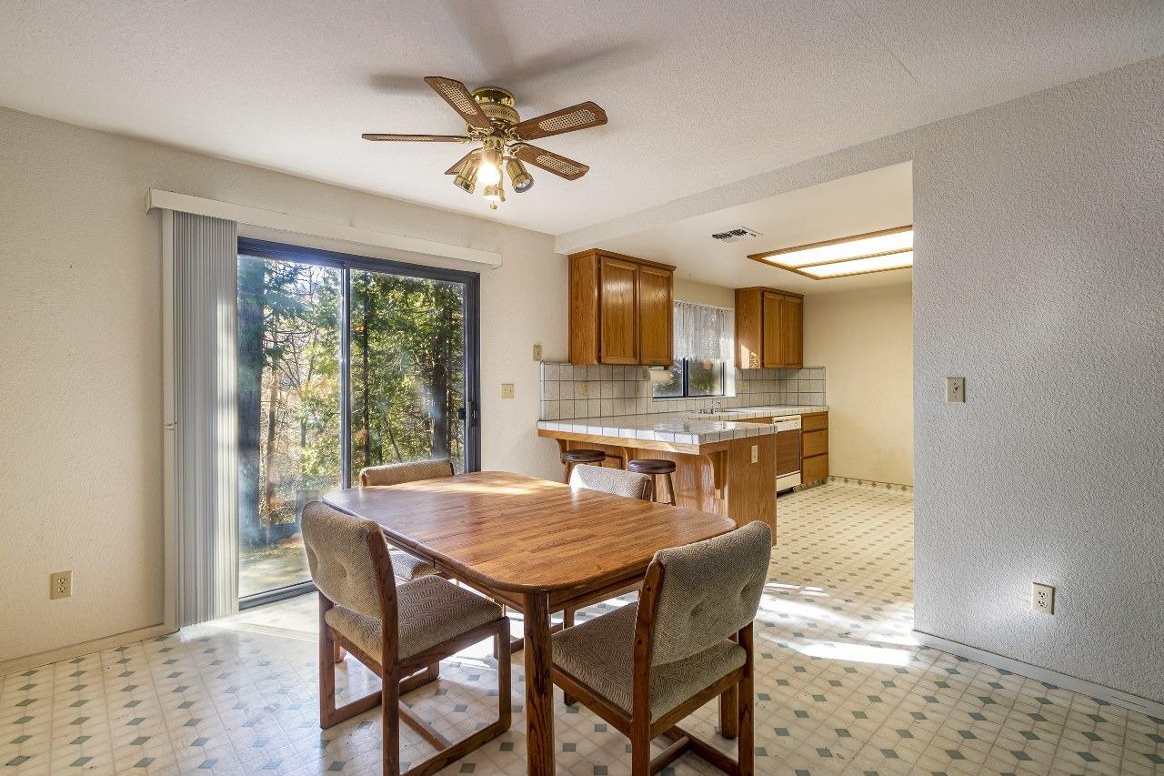 59634 Cascadel Drive North Fork, CA 93643 - Photo 10 of 52 a view of a dining room with furniture