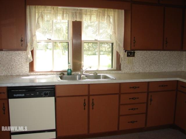 671 North Kent Road Kent, IL 61044 - Photo 8 of 22 a kitchen with granite countertop cabinets stainless steel appliances a sink and a window