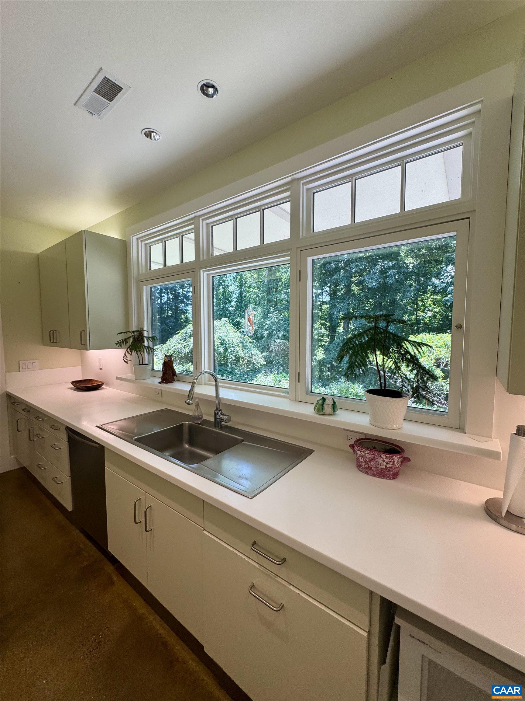 889 Old Garth Road Charlottesville, VA 22901 - Photo 23 of 35 a kitchen with a sink and large window