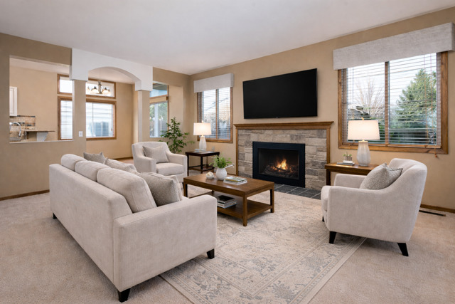 323 Mallard Lane Sugar Grove, IL 60554 - Photo 14 of 32 a living room with furniture flat screen tv and a fireplace