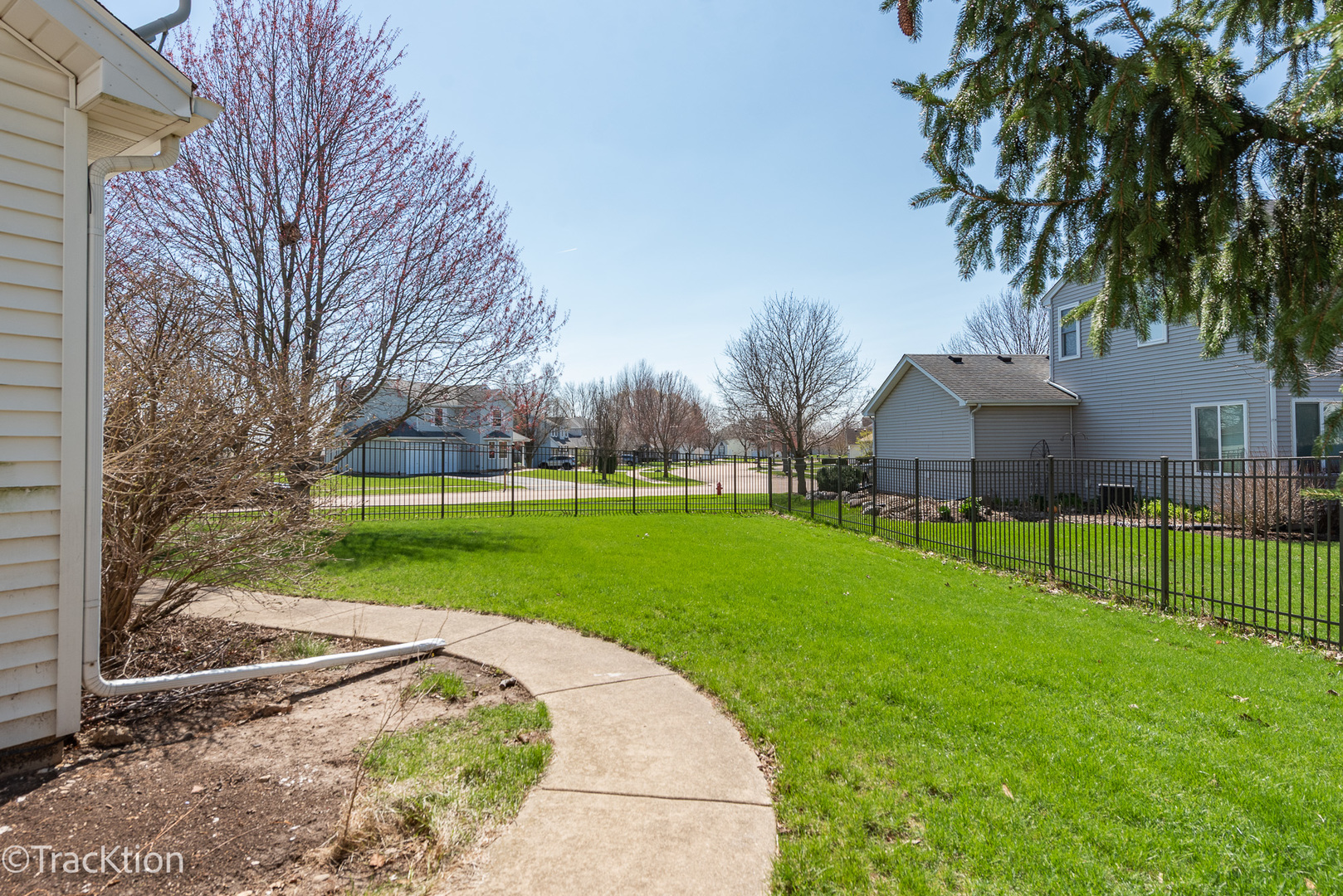 323 Mallard Lane Sugar Grove, IL 60554 - Photo 30 of 32 a view of a house with a big yard and palm trees