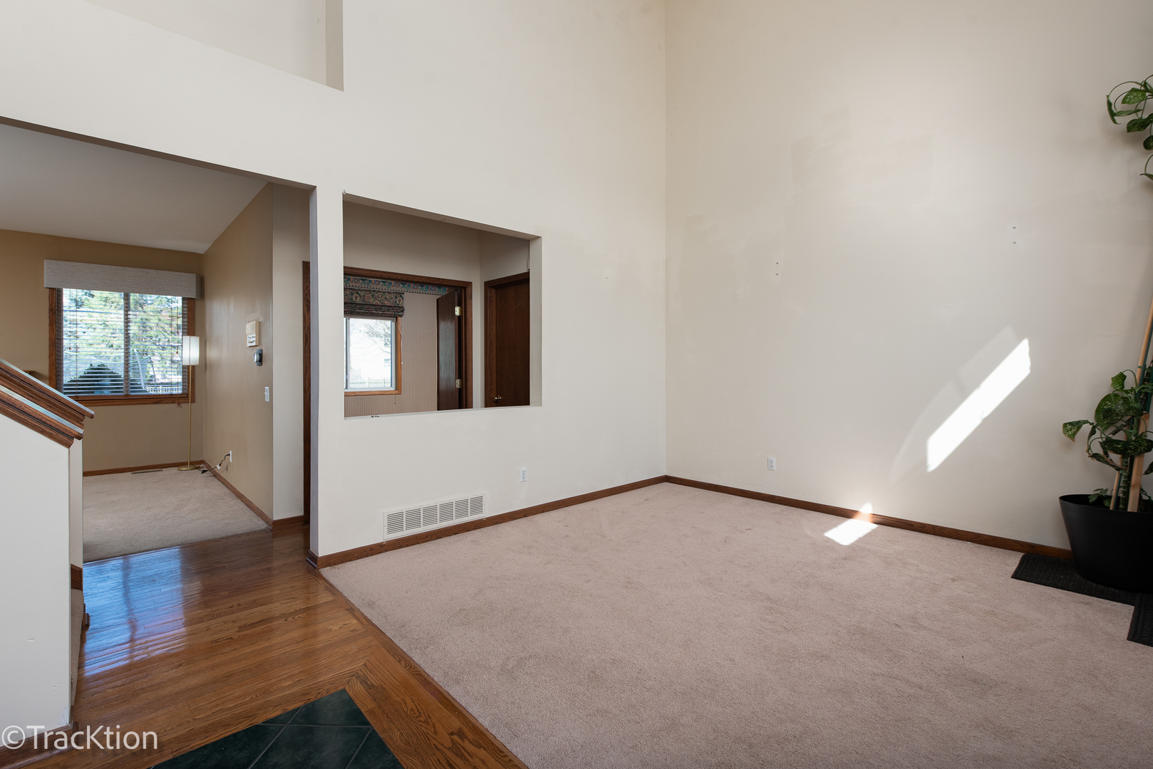 323 Mallard Lane Sugar Grove, IL 60554 - Photo 6 of 32 a view of an empty room with wooden floor and a window