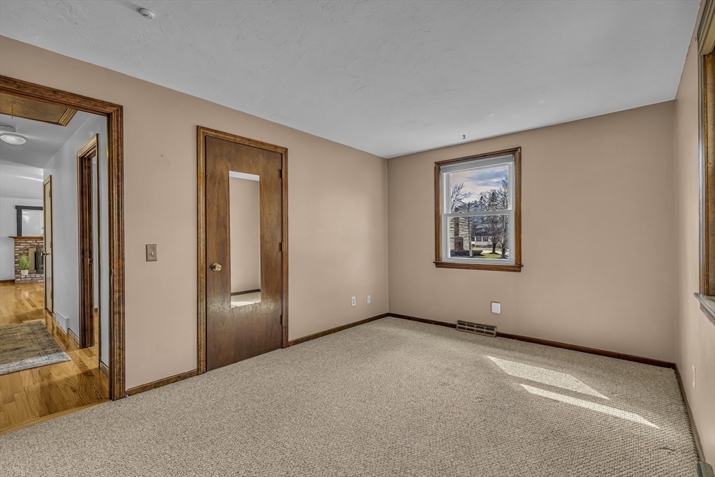 50 Harlow Road Rockland, MA 02370 - Photo 18 of 38 an empty room with windows & entrance