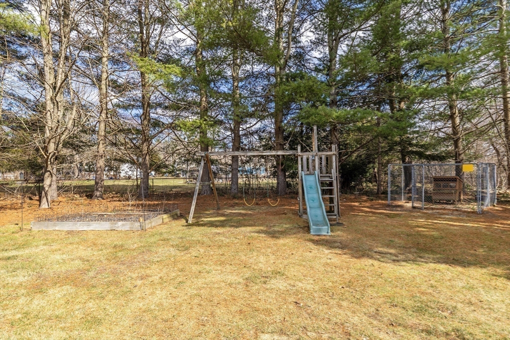 50 Harlow Road Rockland, MA 02370 - Photo 29 of 38 a view of yard with swimming pool and trees