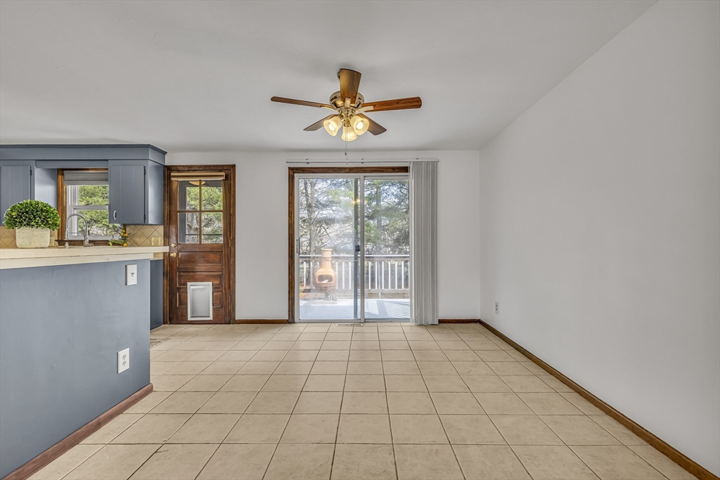 50 Harlow Road Rockland, MA 02370 - Photo 10 of 38 a view of an empty room with window and cabinet