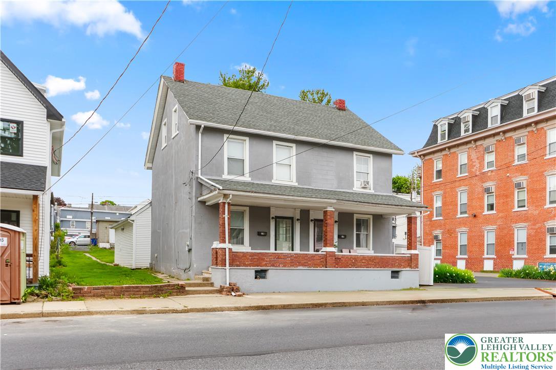 12 South Front Street Coplay, PA 18037 - Photo 35 of 41 This charming home offers a classic facade with a welcoming covered porch.